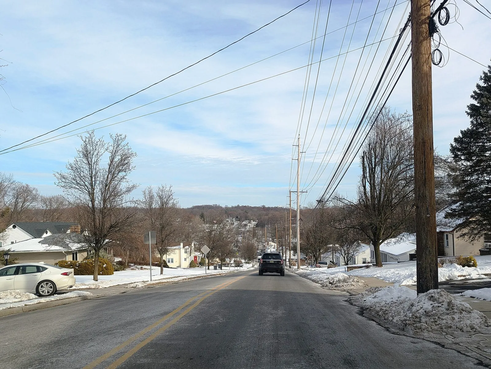 Overlook Avenue in North Haledon, New Jersey in January with snow along the roadside